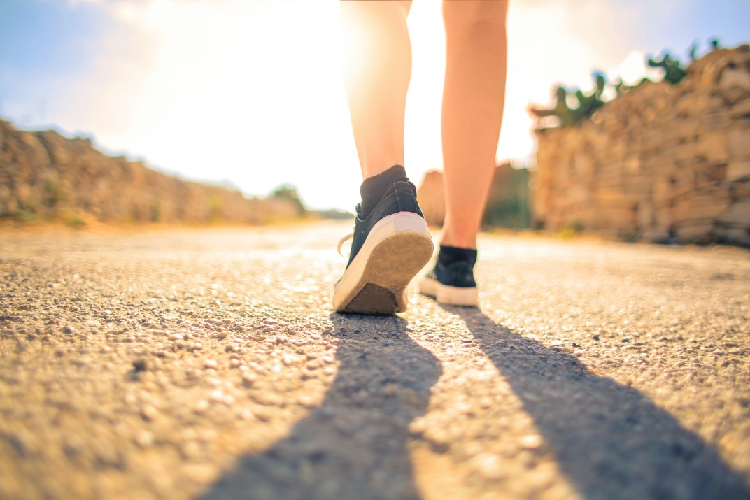  Woman walking on a road