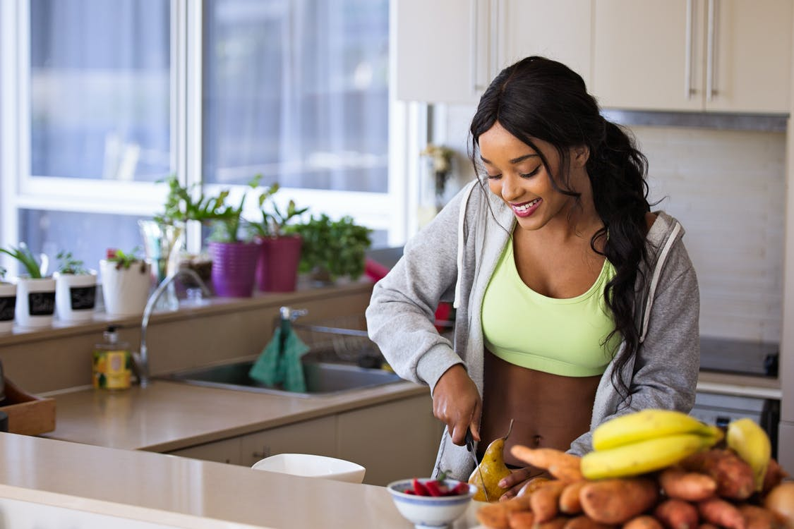 a woman preparing a meal