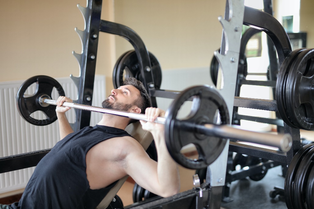 A man lifting a barbell