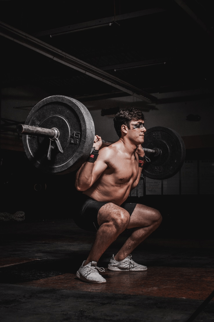 A man lifting a barbell