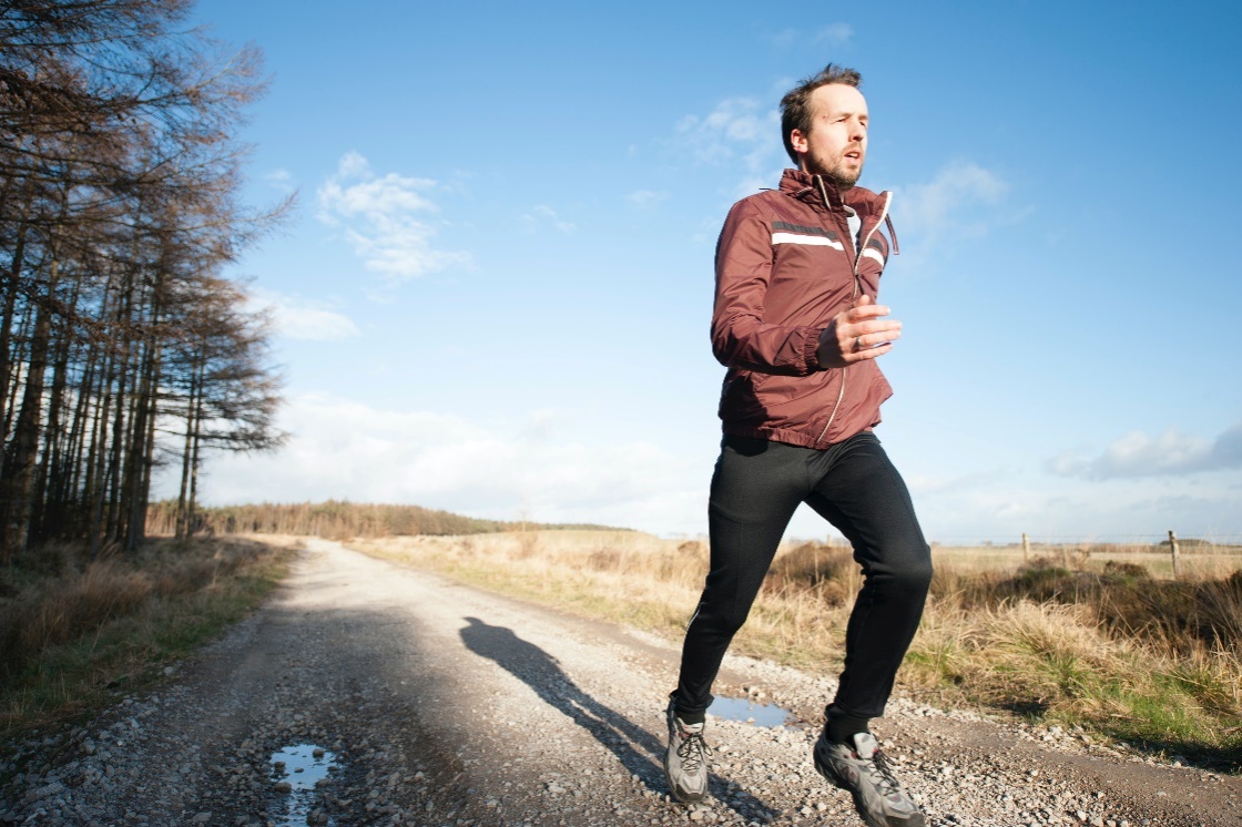 A man jogging on the road