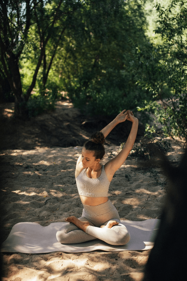  A woman stretching on a mat