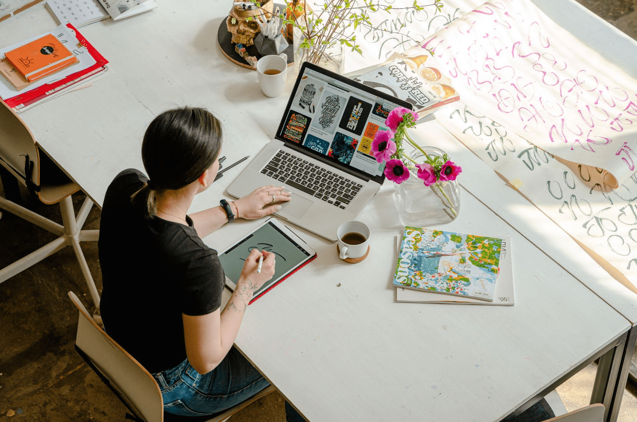 A woman working at her office desk