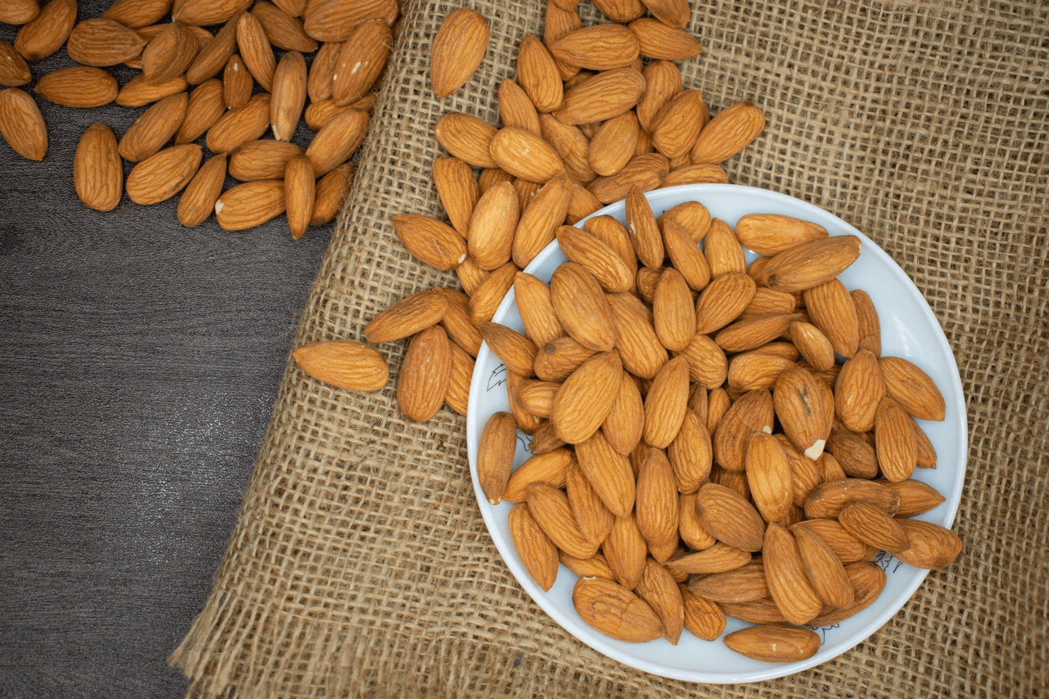 A plate filled with almonds