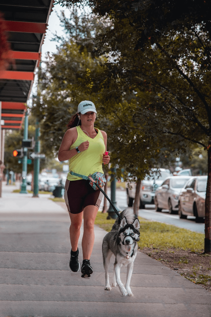 A woman doing a workout with a Husky