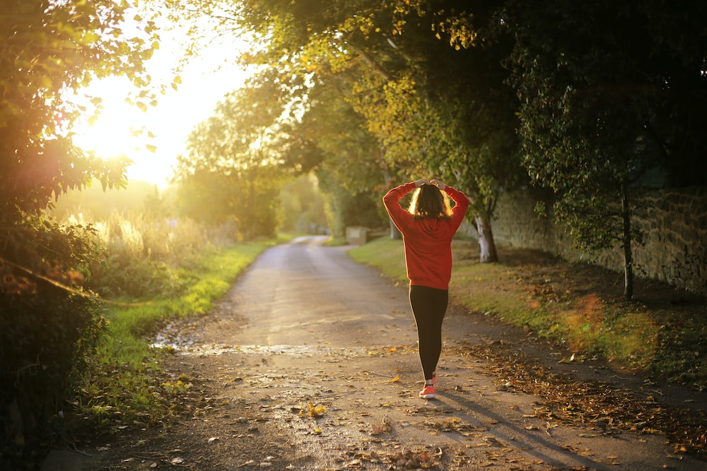 A woman walking in a park