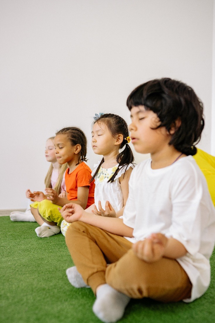 Children doing yoga together