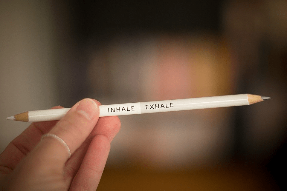 A pencil with inhale and exhale print