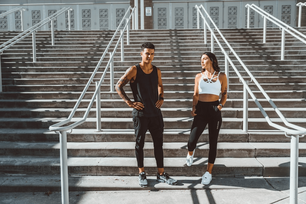 A couple taking a break during their run